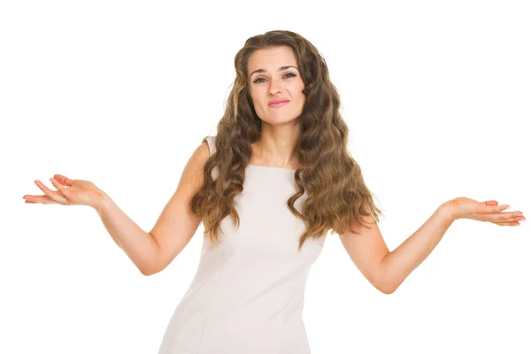 Clueless young woman shrugging shoulders — Stock Photo, Image