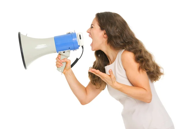 Jovem irritada gritando através do megafone — Fotografia de Stock