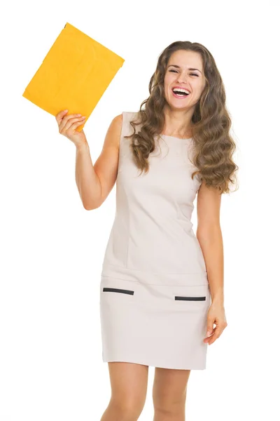 Happy young woman showing letter — Stock Photo, Image