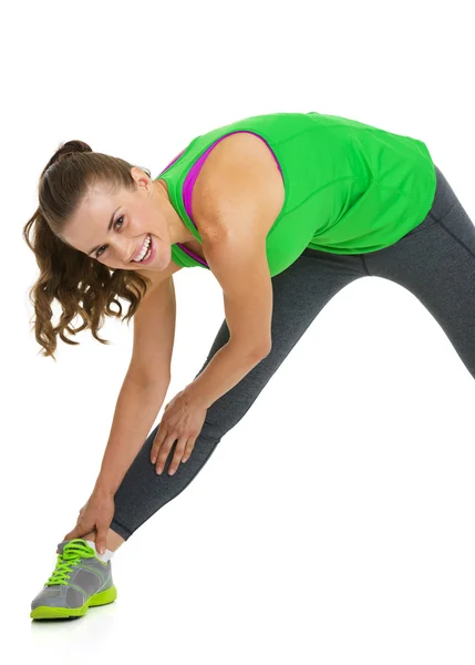 Happy fitness young woman stretching — Stock Photo, Image