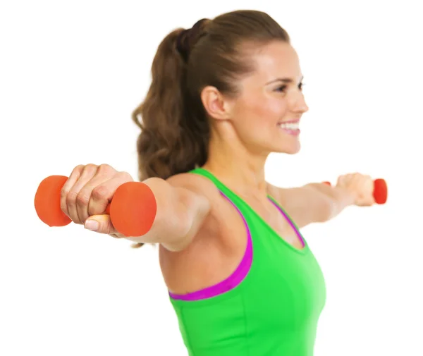 Closeup on dumbbell in hand of fitness young woman — Stock Photo, Image