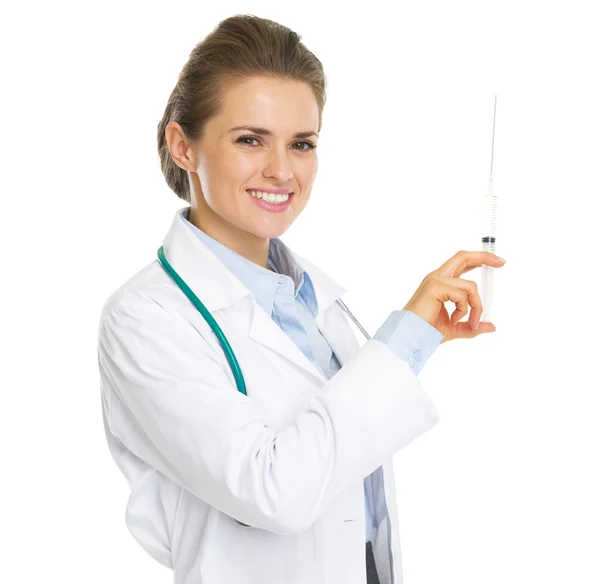 Smiling doctor woman with syringe Royalty Free Stock Photos