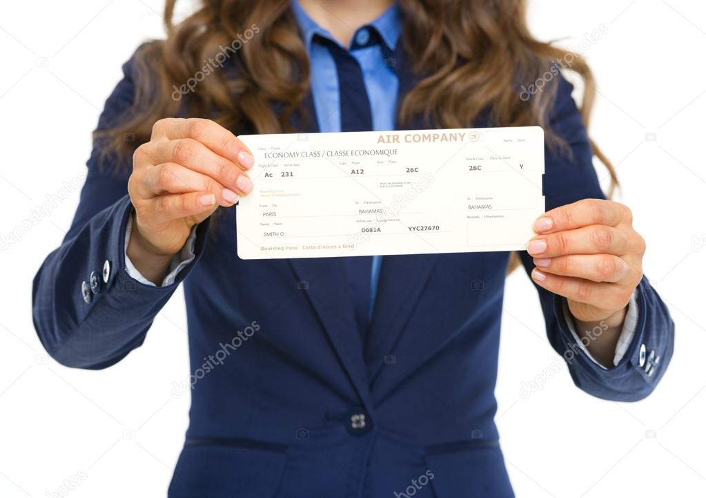 Closeup on business woman giving air tickets