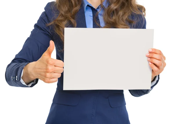 Woman showing blank paper sheet — Stock Photo, Image