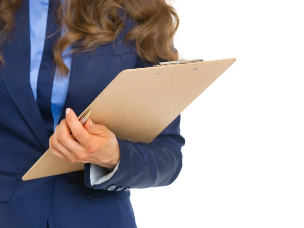 Closeup on business woman with clipboard — Stock Photo, Image