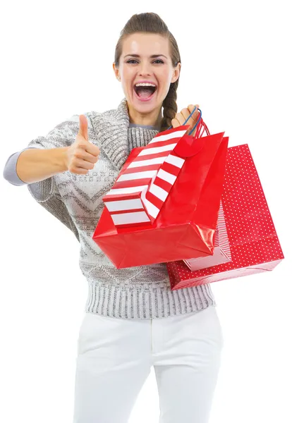 Kvinna i tröja med shopping väska — Stockfoto