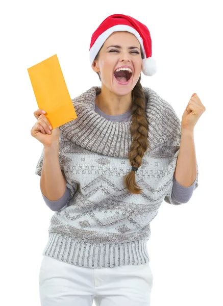 Jeune femme en pull et chapeau de Noël — Photo