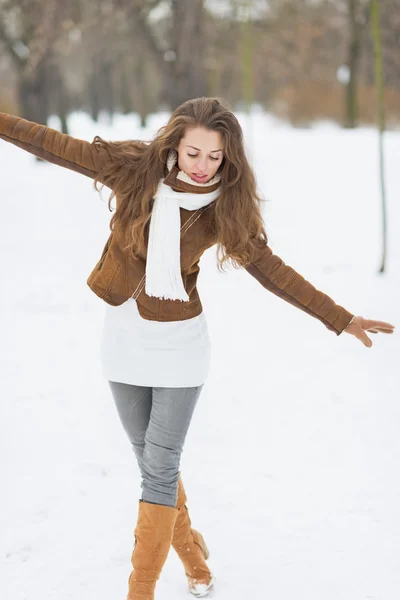 Woman in winter outdoors — Stock fotografie