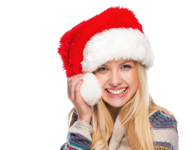 Noel Baba şapkası gülümseyen genç kız portresi
