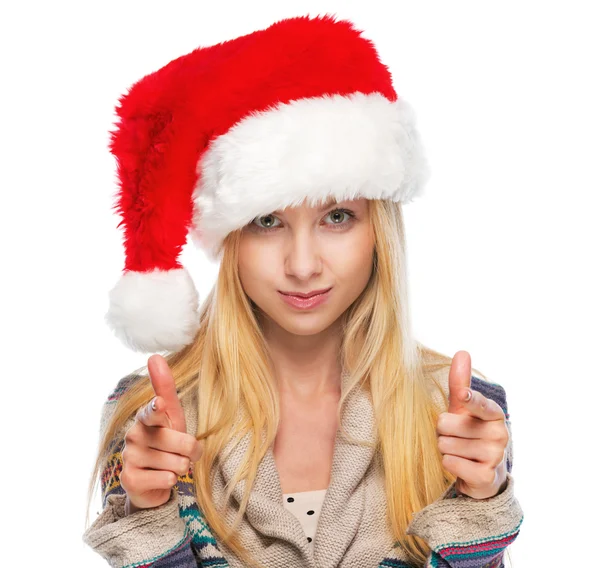 圣诞老人的帽子在相机指向快乐少女的画像 — 图库照片