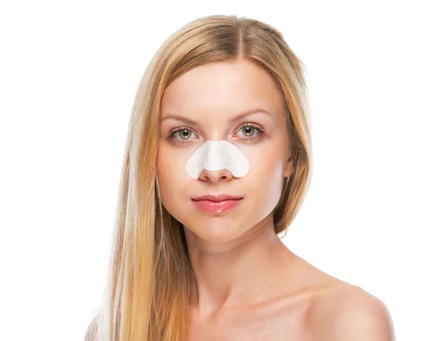 Portret van tiener meisje met duidelijke strips op de neus — Stockfoto