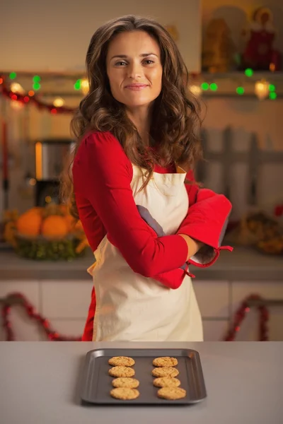 Portrait of proud young housewife made christmas cookies — Stock Photo, Image