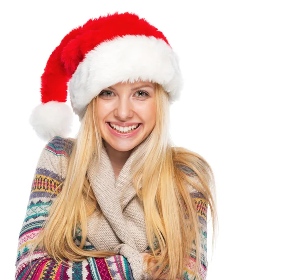 Portrait of smiling teenage girl in santa hat Stock Photo