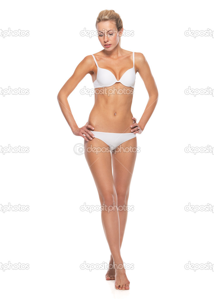 Full length portrait of young woman in lingerie