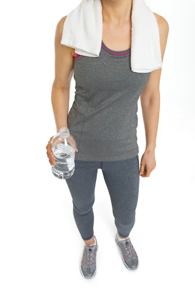 Closeup on fitness young woman with bottle of water — Stock Photo, Image