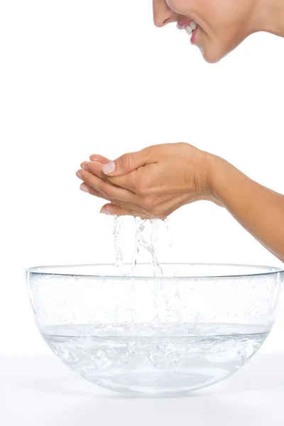 Closeup on young woman washing face — Stock Photo, Image