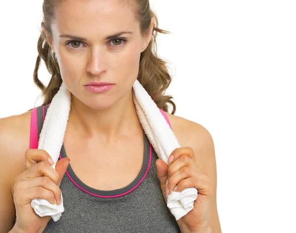 Portrait of serious fitness young woman with towel — Stock Photo, Image