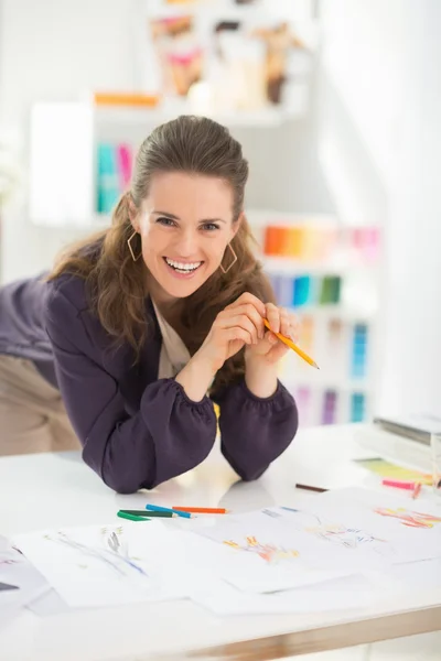 Happy fashion designer in office — Stock Photo, Image