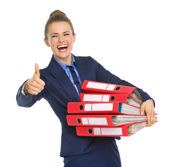 Zakelijke vrouw duimen omhoog met documenten — Stockfoto