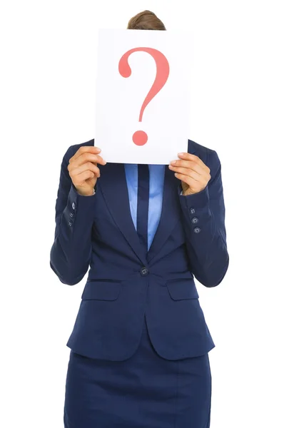 Business woman hiding behind question mark — Stock Photo, Image