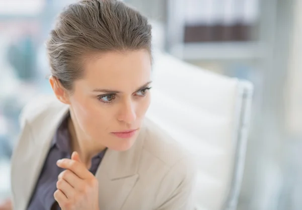 Concerned business woman in office — Stock Photo, Image