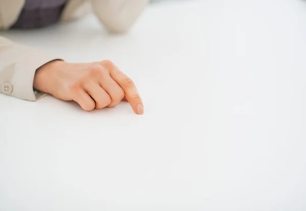 Business woman pointing on desk — Stock Photo, Image