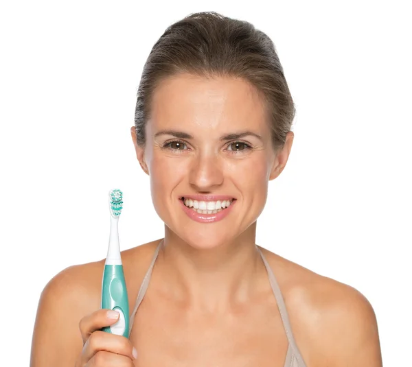 Heureuse jeune femme avec brosse à dents — Photo