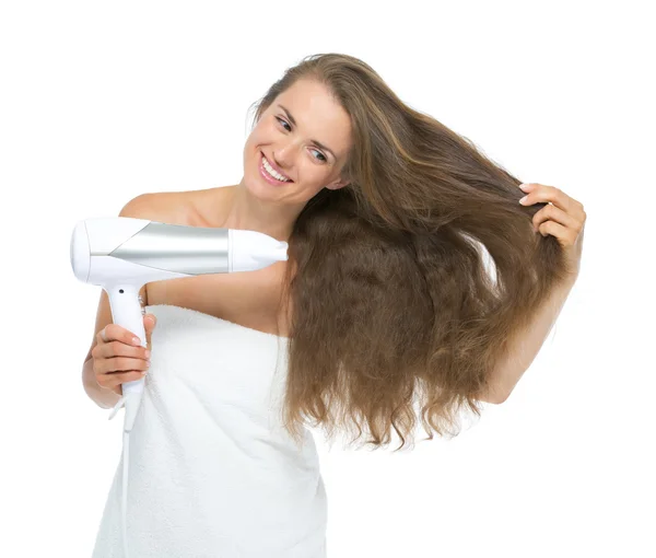 Smiling young woman blow-dry — Stock Photo, Image