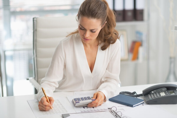 Modern business woman working in office