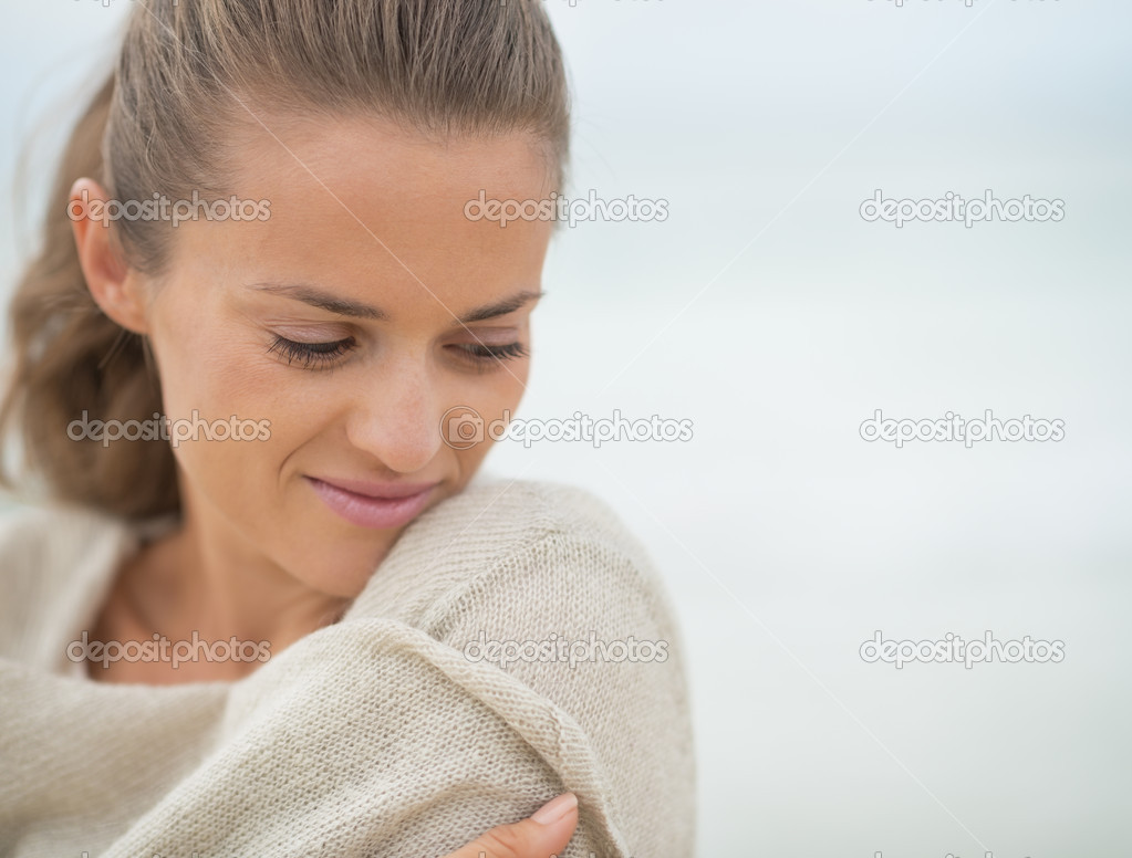 Woman on cold beach