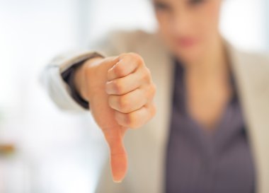 Business woman showing thumbs down clipart