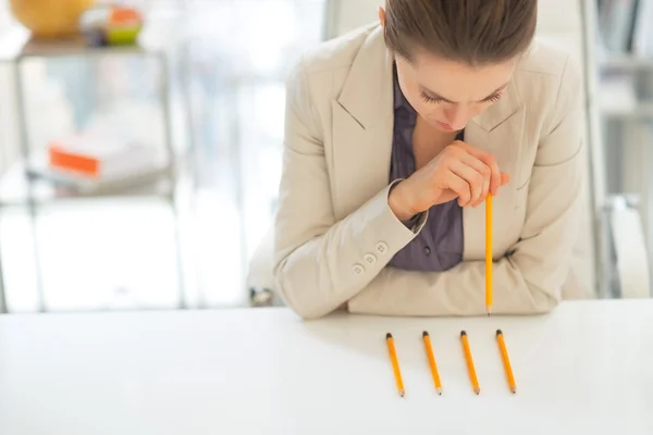 Business woman with pencils — Stock Photo, Image