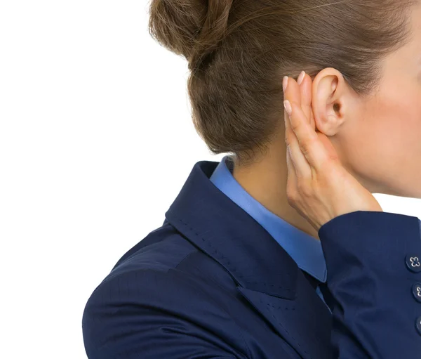 Businesswoman listening — Stock Photo, Image