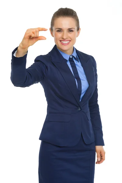 Businesswoman showing little risks — Stock Photo, Image