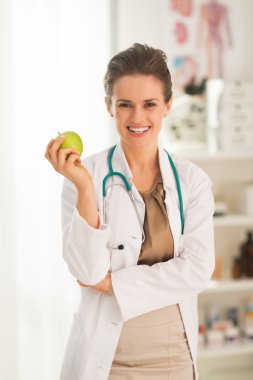 Medical doctor woman with apple clipart