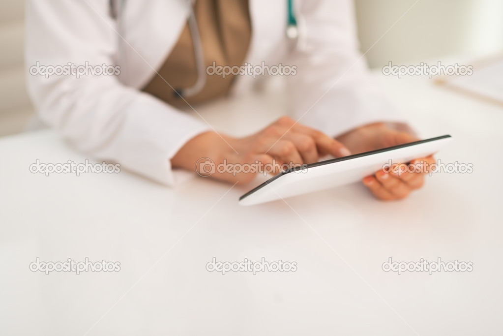 Doctor woman using tablet pc
