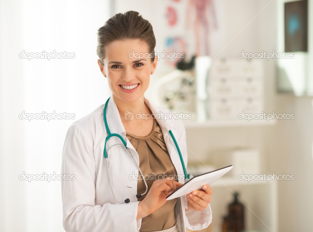 Doctor using tablet pc
