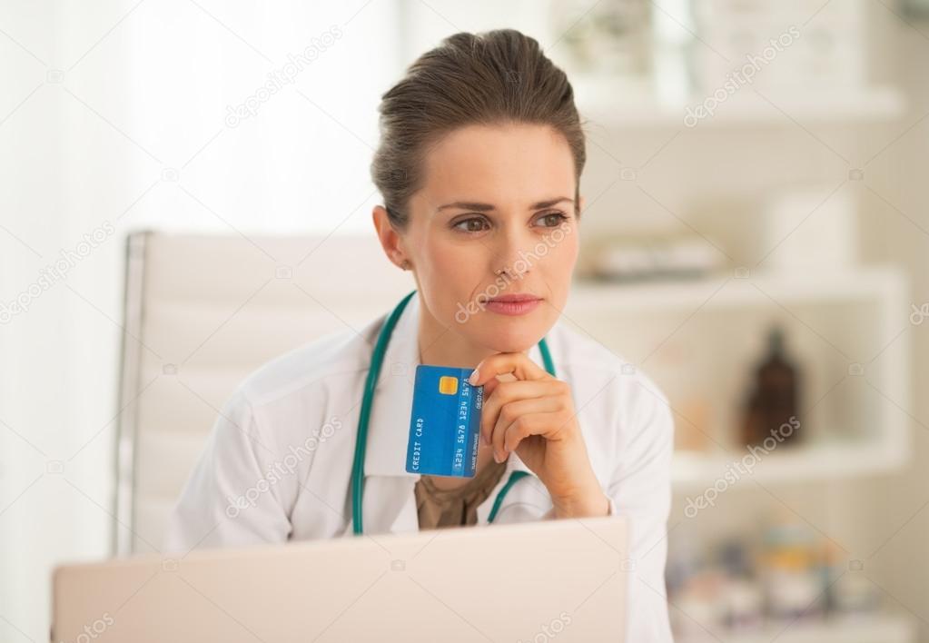 Doctor with credit card