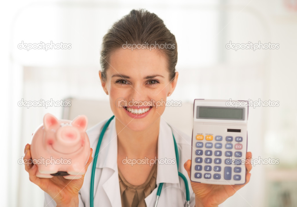 Doctor showing piggy bank and calculator
