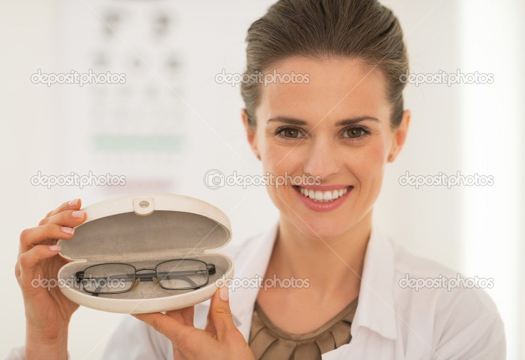 Ophthalmologist showing eyeglasses