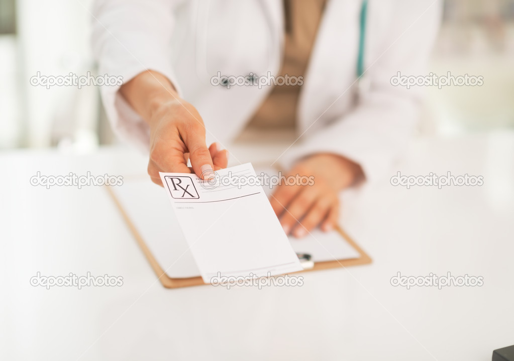 Medical doctor woman giving prescription