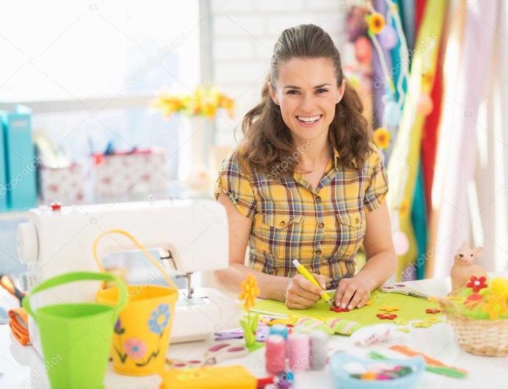 Woman making easter decoration