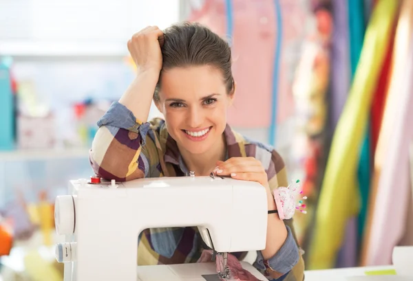 Seamstress with sewing machine — Stock Photo, Image