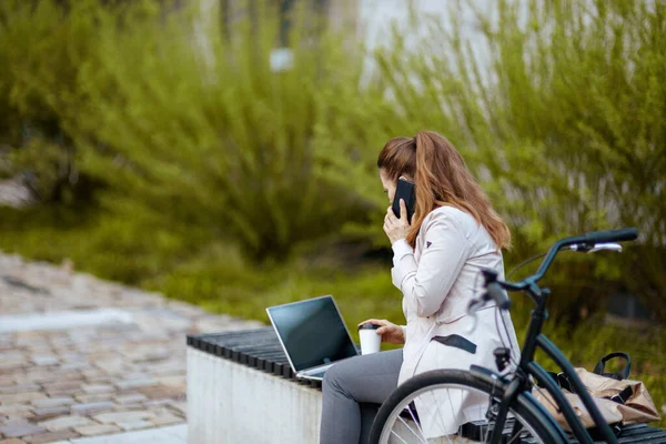 Seen Modern Middle Aged Woman Beige Trench Coat Bicycle Laptop — Φωτογραφία Αρχείου