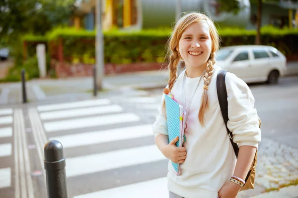 Portrait Happy Modern Child White Sweatshirt Workbook Backpack Crossing Crosswalk - Stock-foto