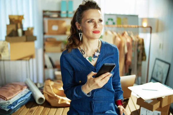 Pensive Elegant Middle Aged Small Business Owner Woman Smartphone Office — Stockfoto