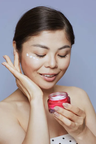 Modern Woman Facial Cream Jar Facial Cream Face Blue Background — Zdjęcie stockowe