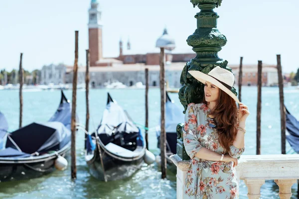 Pensive Trendy Solo Traveller Woman Floral Dress Hat Embankment Venice — Foto Stock