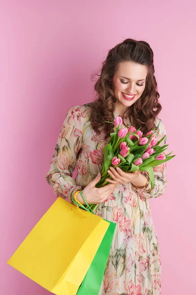 Happy Young Woman Floral Dress Tulips Bouquet Shopping Bags Isolated — 스톡 사진