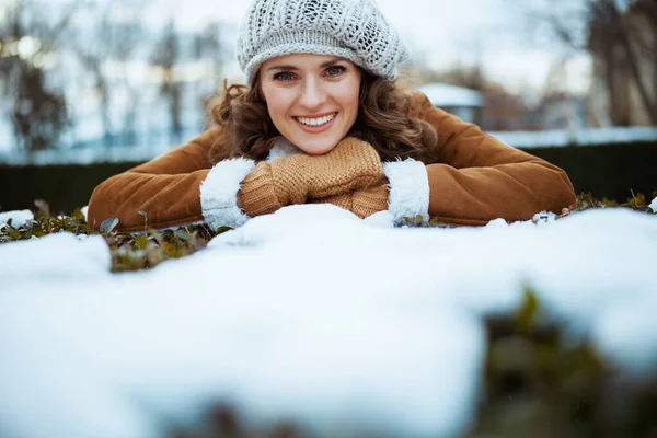 Smiling Modern Middle Aged Woman Mittens Knitted Hat Sheepskin Coat — Zdjęcie stockowe